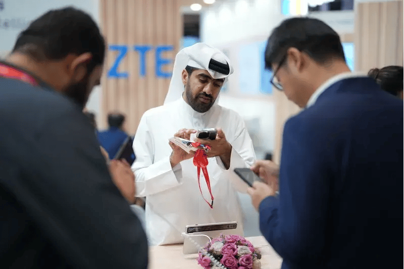 Wide view of the ZTE stand at MWC Doha, featuring technology showcases, interactive demonstrations and attendees exploring next-generation connectivity solutions.